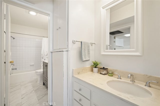 10240 Camarillo St Unit 204, Toluca Lake, CA 91602 - full bathroom with shower / bath combo with shower curtain, vanity, marble finish floor, and toilet