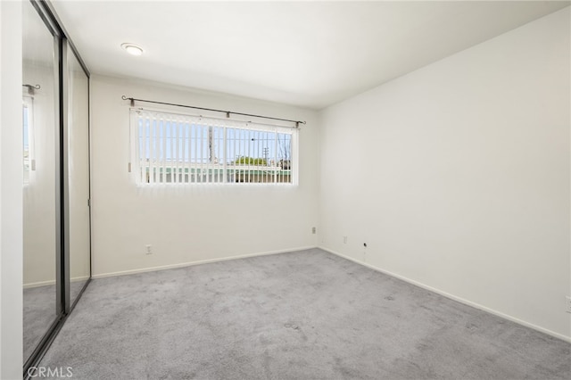 10240 Camarillo St Unit 204, Toluca Lake, CA 91602 - unfurnished bedroom featuring baseboards, carpet, and a closet
