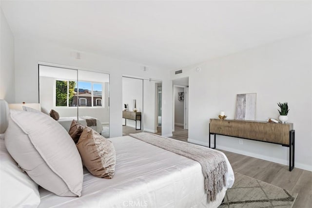 9950 Durant Dr Unit 208, Beverly Hills, CA 90212 - bedroom with wood finished floors and baseboards