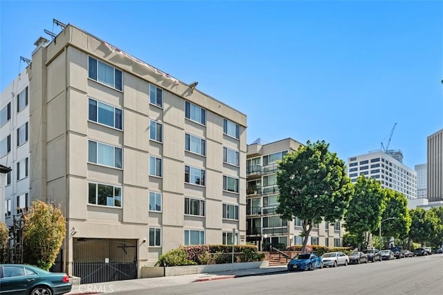 9950 Durant Dr Unit 208, Beverly Hills, CA 90212 - view of apartment building / complex with a garage