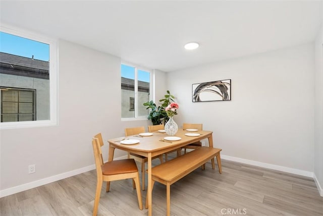 9950 Durant Dr Unit 208, Beverly Hills, CA 90212 - dining room with light wood-style flooring and baseboards