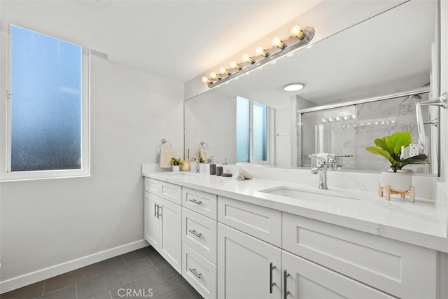 9950 Durant Dr Unit 208, Beverly Hills, CA 90212 - bathroom featuring double vanity, a marble finish shower, and baseboards