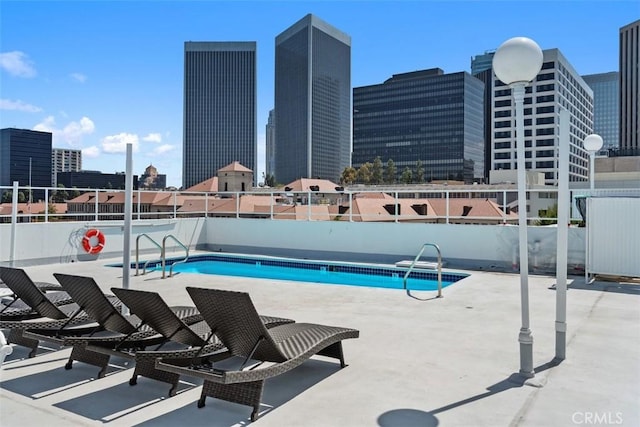 9950 Durant Dr Unit 208, Beverly Hills, CA 90212 - community pool featuring a view of skyline and a patio area