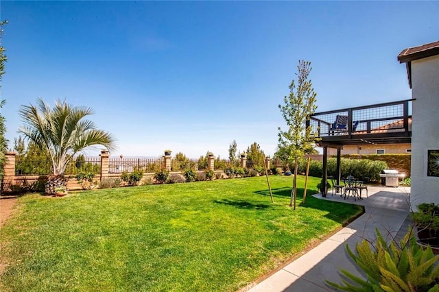 view of yard with a patio area and fence