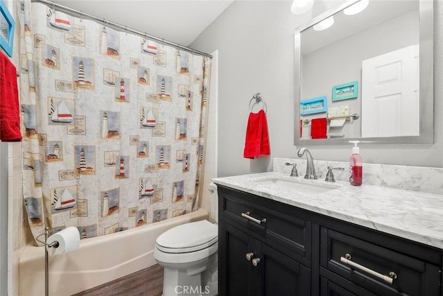 bathroom with shower / bath combination with curtain, vanity, toilet, and wood finished floors