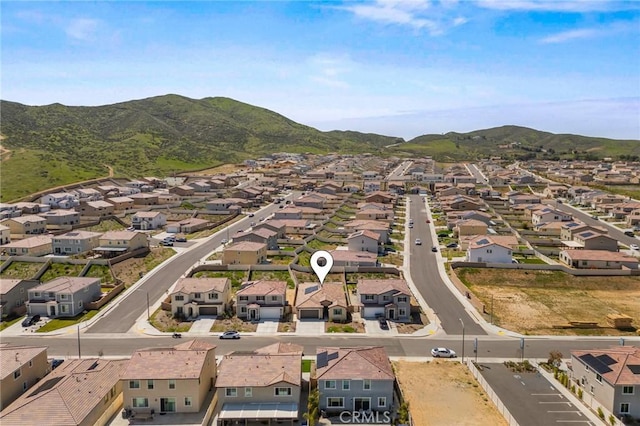 aerial view with a mountain view and a residential view