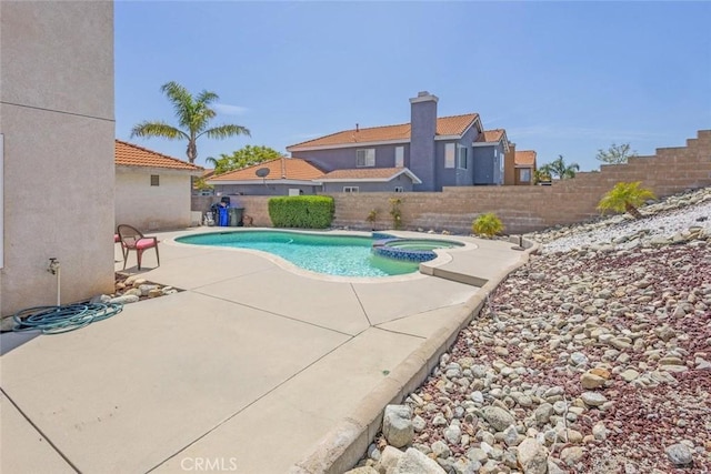 3594 N Verbena, Rialto, CA 92377 - view of swimming pool featuring a fenced backyard, a pool with connected hot tub, and a patio area