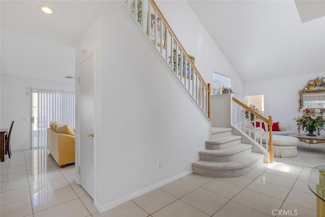 3594 N Verbena, Rialto, CA 92377 - stairs featuring tile patterned flooring, lofted ceiling, and recessed lighting