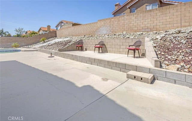 3594 N Verbena, Rialto, CA 92377 - fenced backyard with a patio area