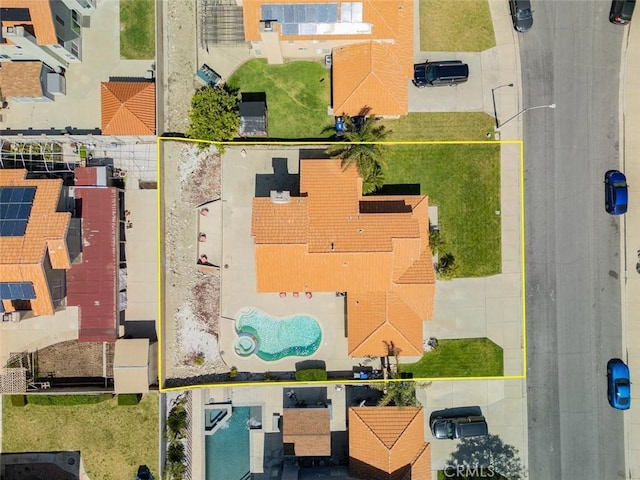3594 N Verbena, Rialto, CA 92377 - aerial view of property and surrounding area with a pool area and property boundaries highlighted