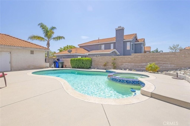 3594 N Verbena, Rialto, CA 92377 - view of swimming pool featuring a patio and a pool with connected hot tub