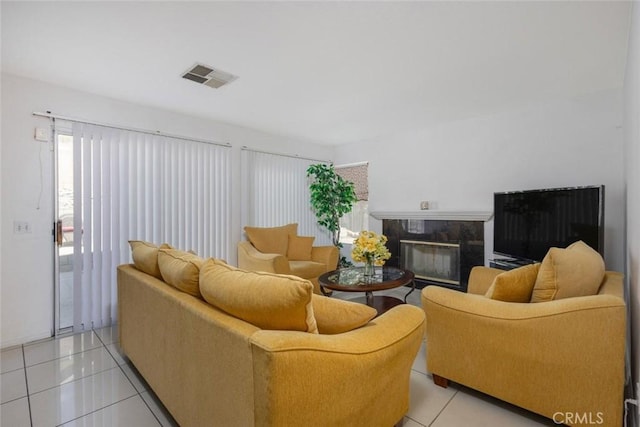 3594 N Verbena, Rialto, CA 92377 - living area featuring light tile patterned flooring and a premium fireplace