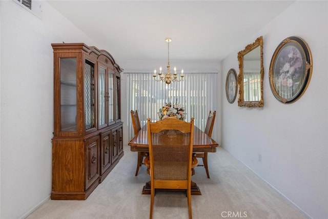 3594 N Verbena, Rialto, CA 92377 - dining area with a chandelier and light colored carpet
