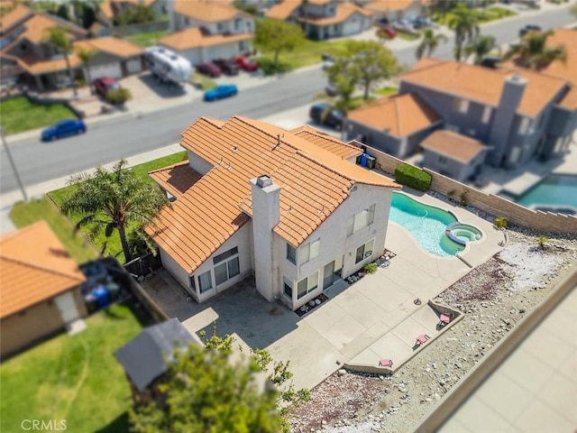 3594 N Verbena, Rialto, CA 92377 - aerial view of residential area featuring a pool area