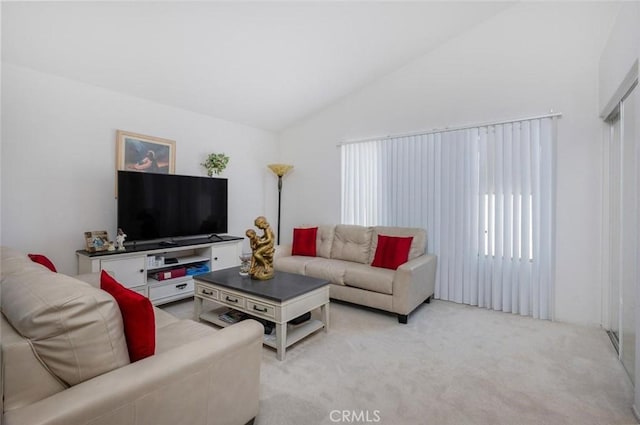 3594 N Verbena, Rialto, CA 92377 - living area with vaulted ceiling, plenty of natural light, and light carpet