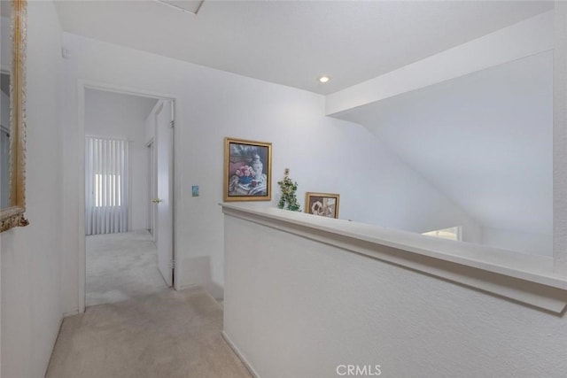 3594 N Verbena, Rialto, CA 92377 - corridor featuring light carpet, lofted ceiling, and recessed lighting