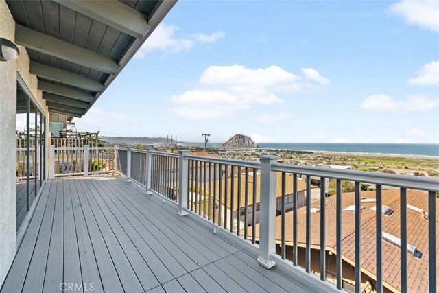 deck featuring a water view