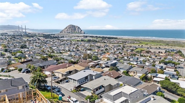birds eye view of property featuring a water view and a residential view