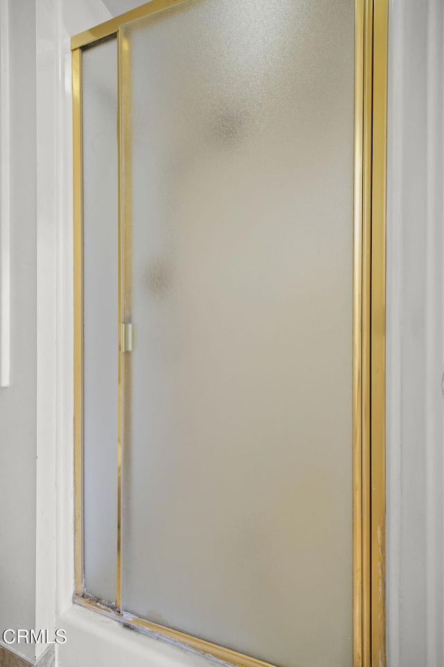 full bathroom with a shower stall