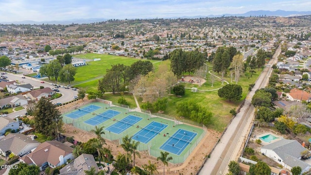 drone / aerial view featuring a mountain view and a residential view