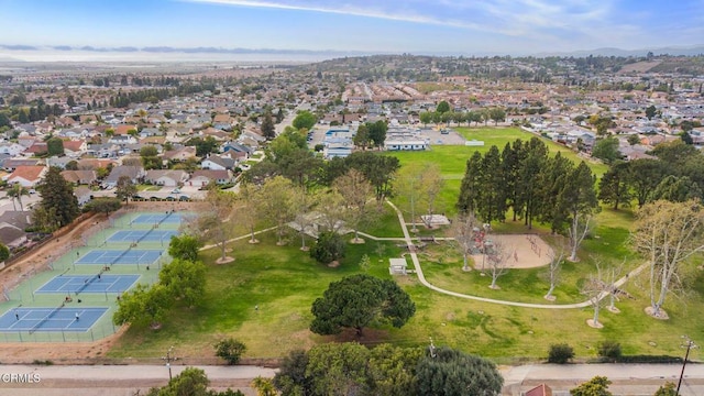 birds eye view of property with a residential view