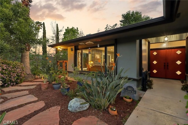 1460 E Glenoaks Blvd, Glendale, CA 91206 - exterior entry at dusk with concrete driveway and stucco siding