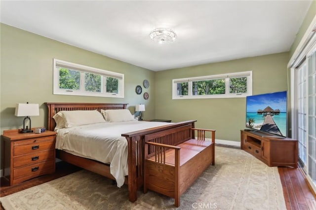 1460 E Glenoaks Blvd, Glendale, CA 91206 - bedroom with multiple windows, wood finished floors, and baseboards