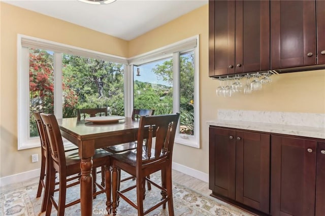 1460 E Glenoaks Blvd, Glendale, CA 91206 - dining space featuring baseboards and a bar
