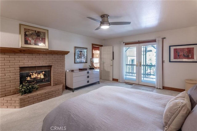 381 Old Toll Rd, Lake Arrowhead, CA 92317 - carpeted bedroom featuring baseboards, a brick fireplace, a ceiling fan, french doors, and access to outside