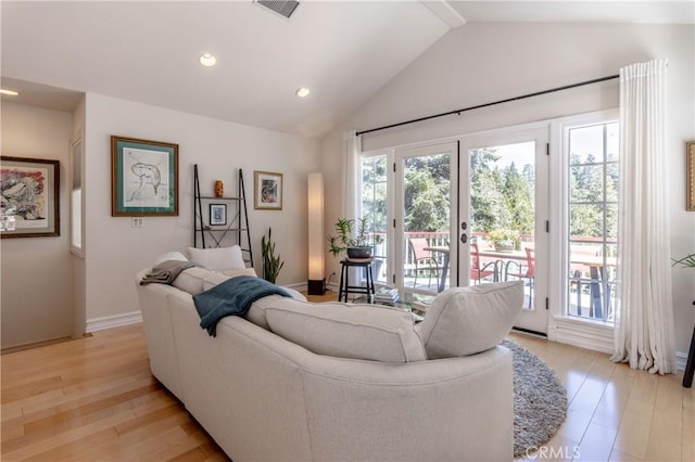 381 Old Toll Rd, Lake Arrowhead, CA 92317 - living area with light wood-type flooring, visible vents, recessed lighting, lofted ceiling, and french doors