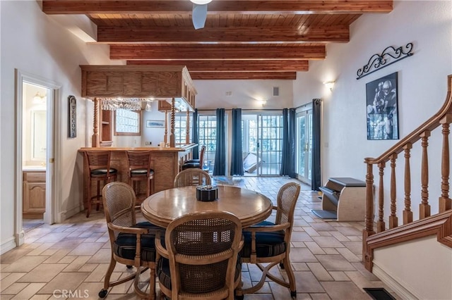 381 Old Toll Rd, Lake Arrowhead, CA 92317 - dining space featuring plenty of natural light, wood ceiling, and beam ceiling