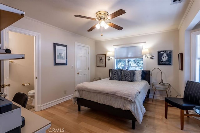 381 Old Toll Rd, Lake Arrowhead, CA 92317 - bedroom featuring visible vents, baseboards, ornamental molding, light wood-style floors, and connected bathroom