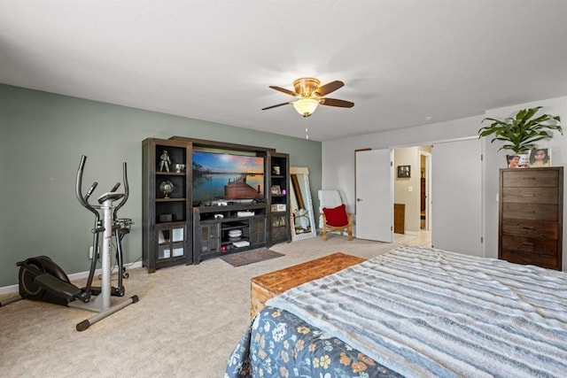 bedroom with carpet and a ceiling fan