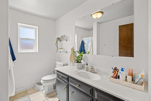 bathroom featuring vanity, tile patterned flooring, toilet, a shower with shower curtain, and baseboards