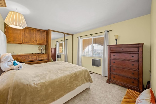 bedroom featuring light carpet