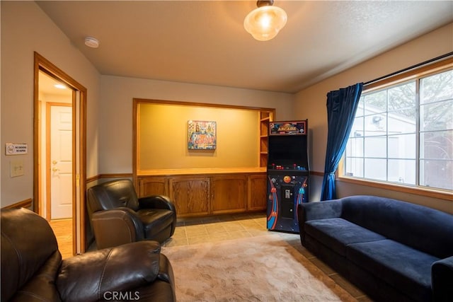 living area with light tile patterned flooring