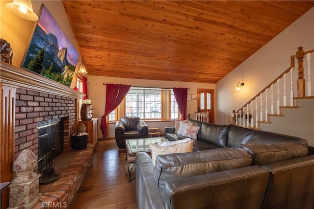 living area with wood ceiling, lofted ceiling, and a brick fireplace