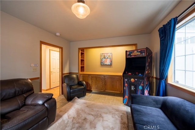 living area with light tile patterned floors
