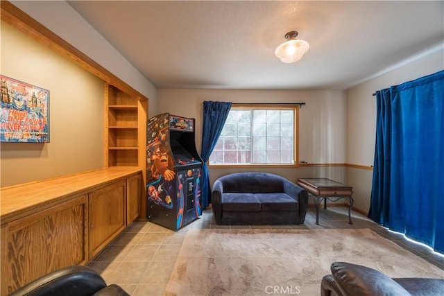 living area with light tile patterned flooring