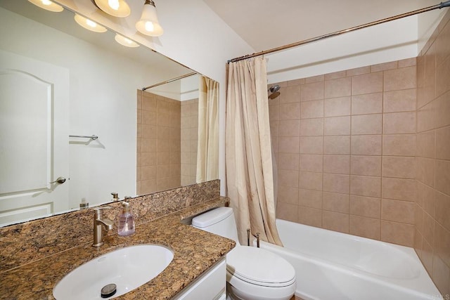 bathroom with vanity, toilet, and shower / tub combo