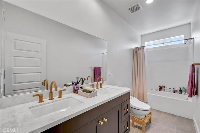 full bath with a sink, visible vents, toilet, and shower / tub combo