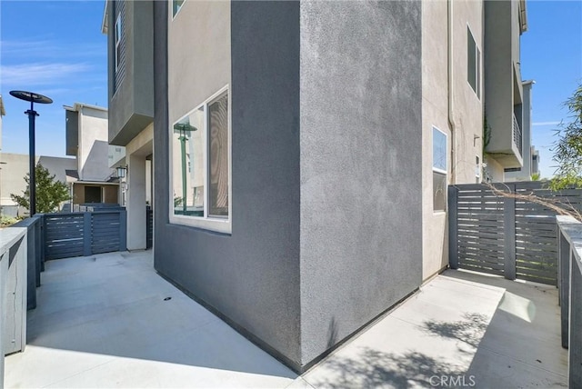 view of property exterior with stucco siding