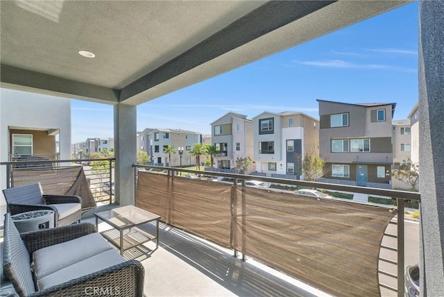 balcony featuring a residential view