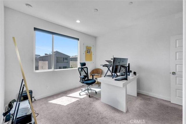 carpeted office with recessed lighting and baseboards
