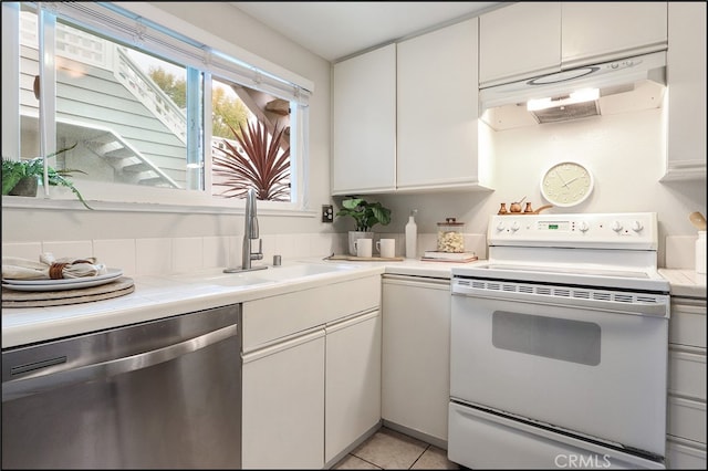 3 Hillrose, Aliso Viejo, CA 92656 - kitchen featuring dishwasher, tile counters, white cabinetry, under cabinet range hood, and white electric stove