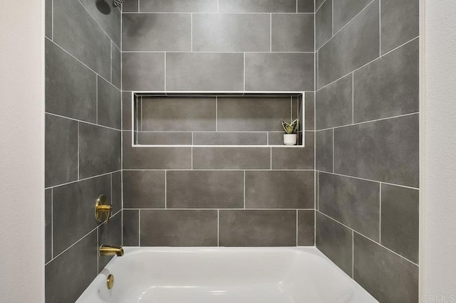 full bath featuring shower / tub combination