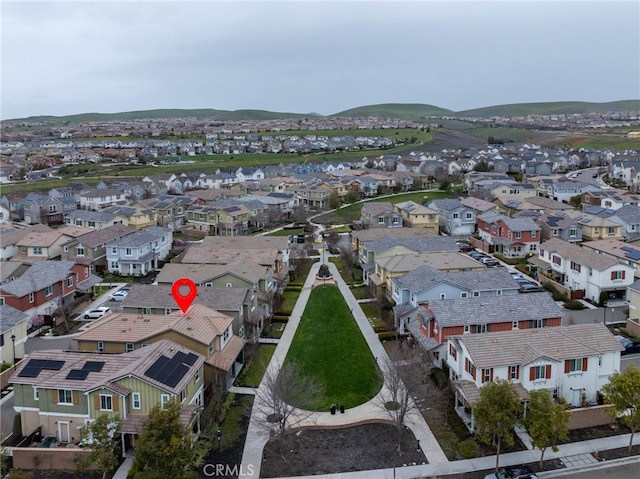 birds eye view of property with a residential view
