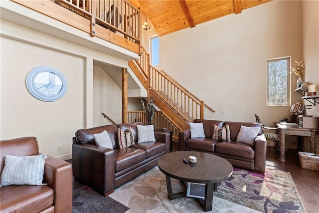 living room featuring high vaulted ceiling, stairs, wood ceiling, and wood finished floors