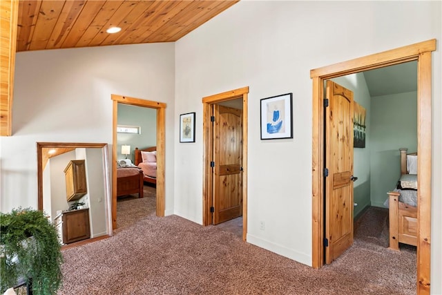 756 Brentwood Dr, Lake Arrowhead, CA 92352 - hallway featuring carpet flooring, wood ceiling, recessed lighting, and high vaulted ceiling
