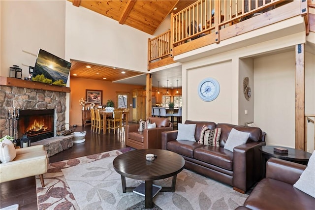 756 Brentwood Dr, Lake Arrowhead, CA 92352 - living area with wood finished floors, wooden ceiling, high vaulted ceiling, and a fireplace